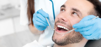 Young Man At The Dentist