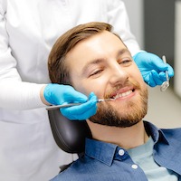 happy man at the dentist