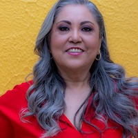 Woman with silver hair smiling