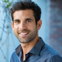 Handsome mid adult man smiling and looking at camera. Portrait of happy young casual man