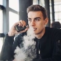young man vaping