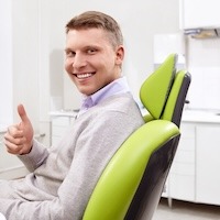 Caucasian Man Smiling in Dental Chair